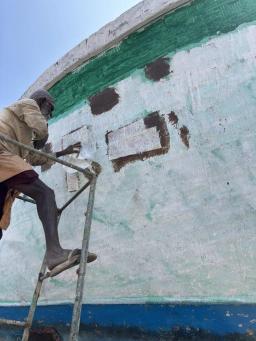 Boat hull bottom during antifouling coating process